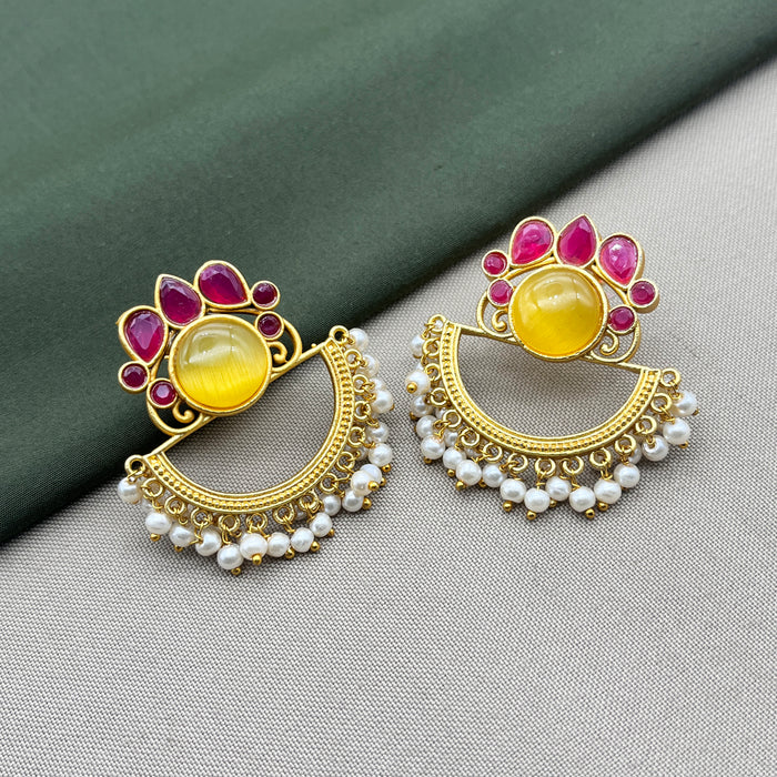 Diwam Jewels' gold-plated Traditional and Meenakari Earring Set featuring vibrant pink and yellow stones, paired with beautiful pearls