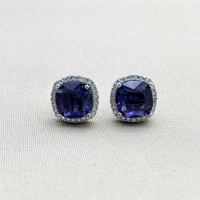 Elegant Silver Stud Earrings with Deep Blue Sapphire and Sparkling CZ Stones