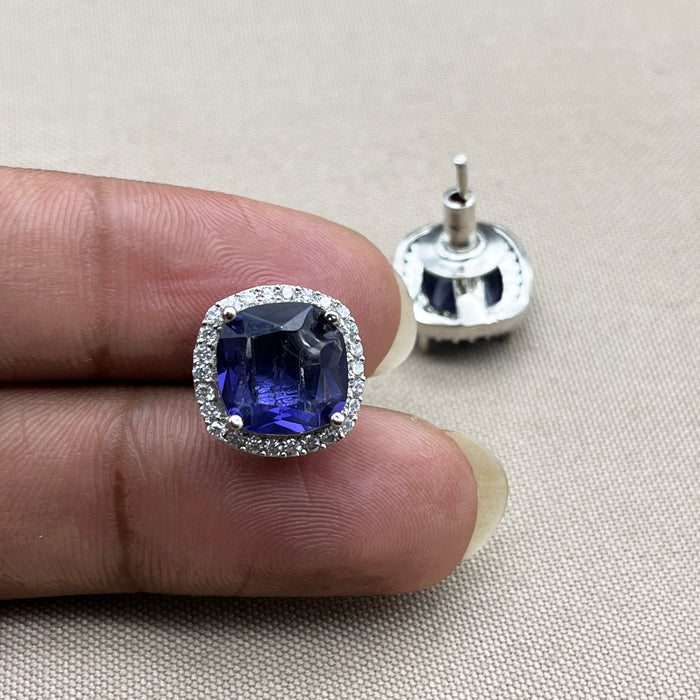 Elegant Silver Stud Earrings with Deep Blue Sapphire and Sparkling CZ Stones
