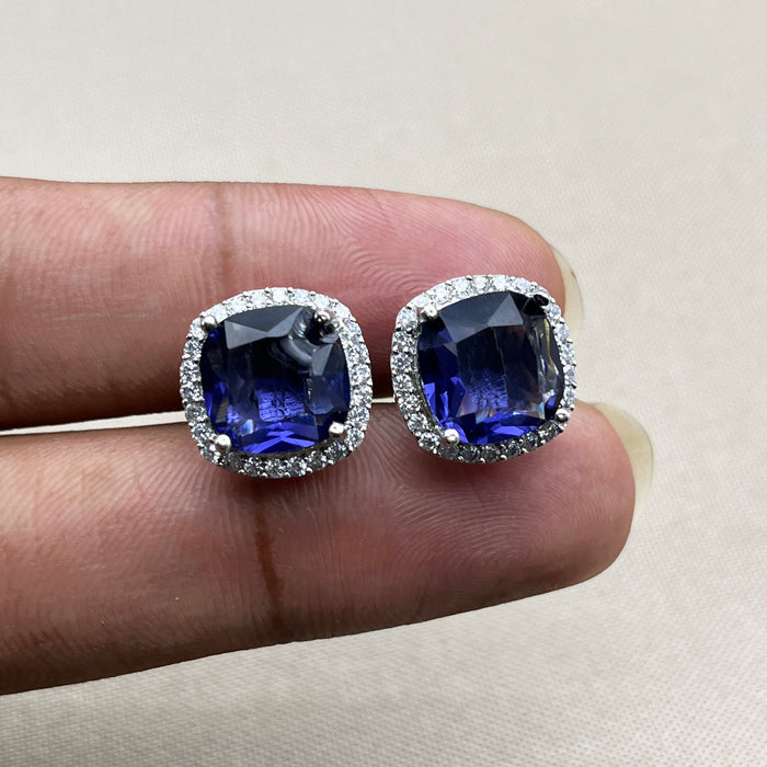Elegant Silver Stud Earrings with Deep Blue Sapphire and Sparkling CZ Stones