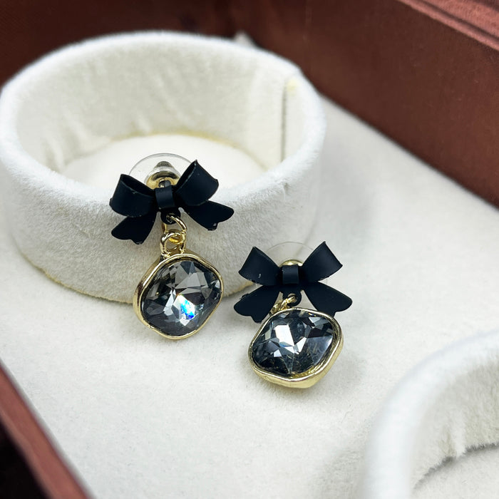 Elegant Black Bow & Crystal Drop Earrings – Gold Trimmed Statement Studs