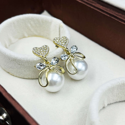 Gold-Plated Heart & Bow Pearl Drop Earrings with CZ Stones
