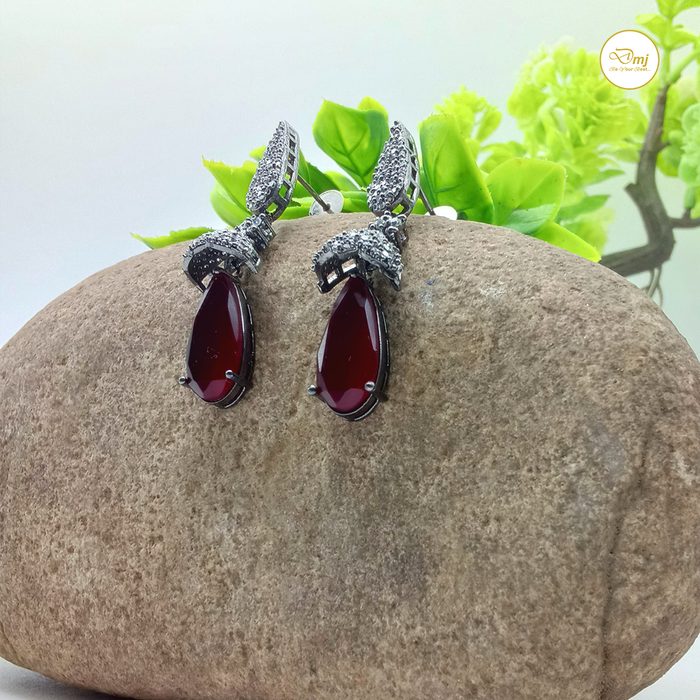 Glamorous Garnet and AD Stone Silver Plated Earrings by DiwamJewels