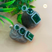 Elegant Silver-Plated Earrings Studded with Emerald Stone