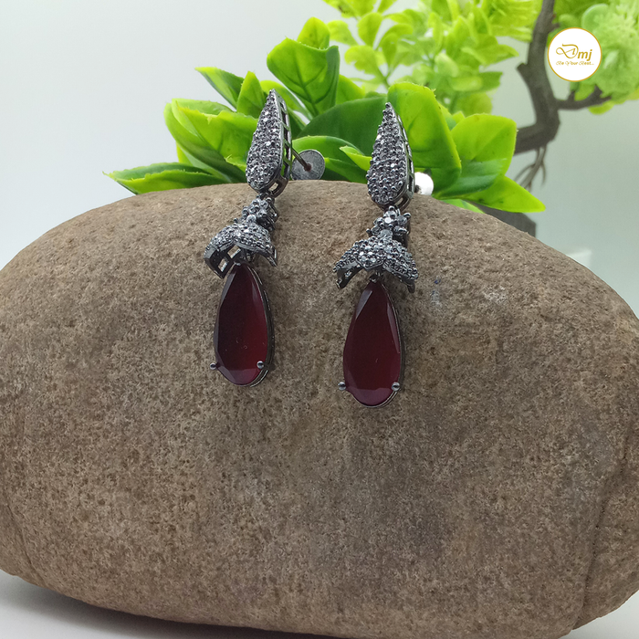 Glamorous Garnet and AD Stone Silver Plated Earrings by DiwamJewels