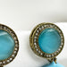 Beautiful Gold-Plated Jhumka Earrings with Turquoise Meenakari