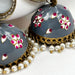 Gold-Plated Jhumka Earrings with Gray Meenakari Work and Pearls