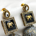 Gold-Plated Jhumka Earrings with Gray Elephant Design and Pearls