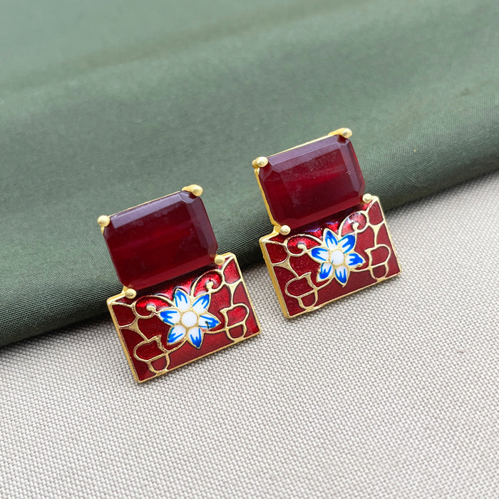 Meenakari Work Gold-Plated Earring Set studded with Garnet Brass