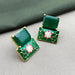 Gold-Plated Floral Green Stud Earrings with Emerald & Meenakari Work