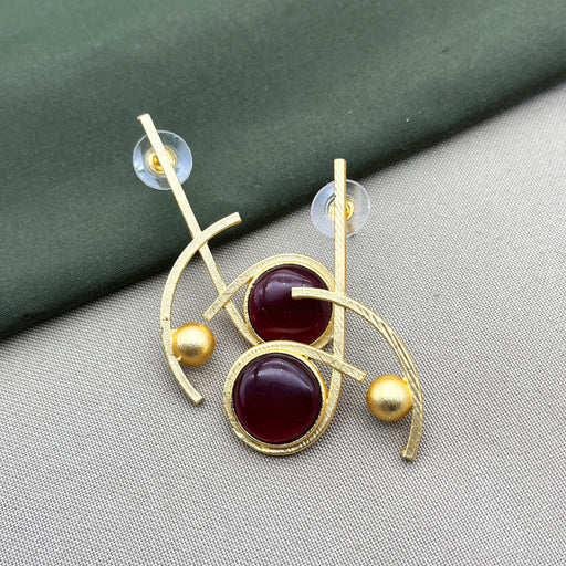 Artistic Gold Plated Brass Drops & Danglers Earring featuring Red Garnet Stone