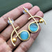 Artistic Gold Plated Brass Drops & Danglers Earring with Aquamarine