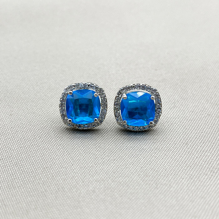 Elegant Silver Stud Earrings with Blue Topaz and CZ Stones