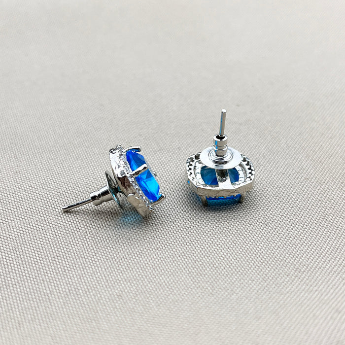 Elegant Silver Stud Earrings with Blue Topaz and CZ Stones