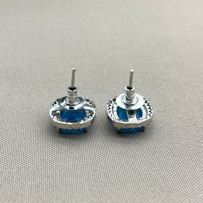 Elegant Silver Stud Earrings with Blue Topaz and CZ Stones