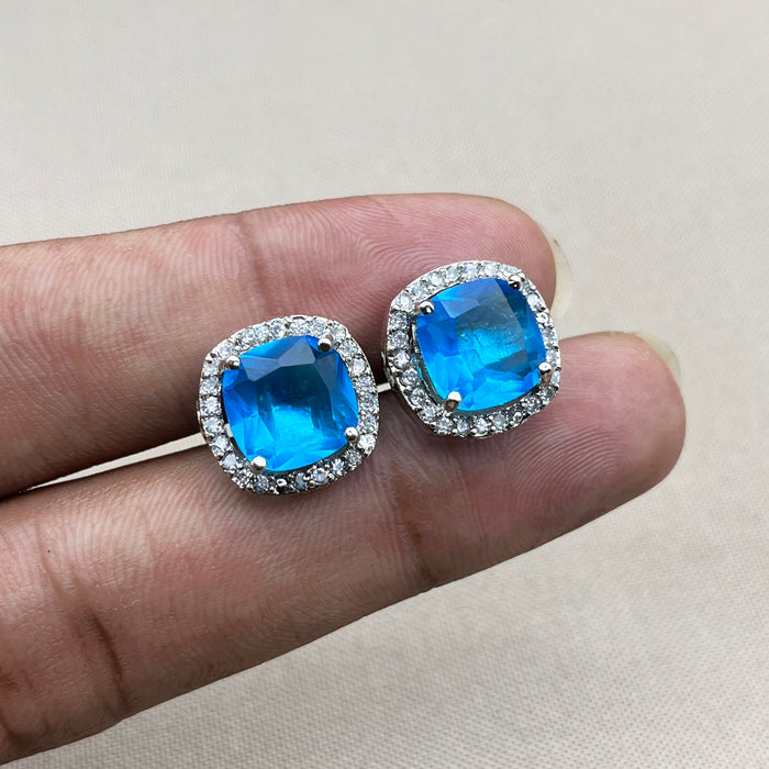 Elegant Silver Stud Earrings with Blue Topaz and CZ Stones