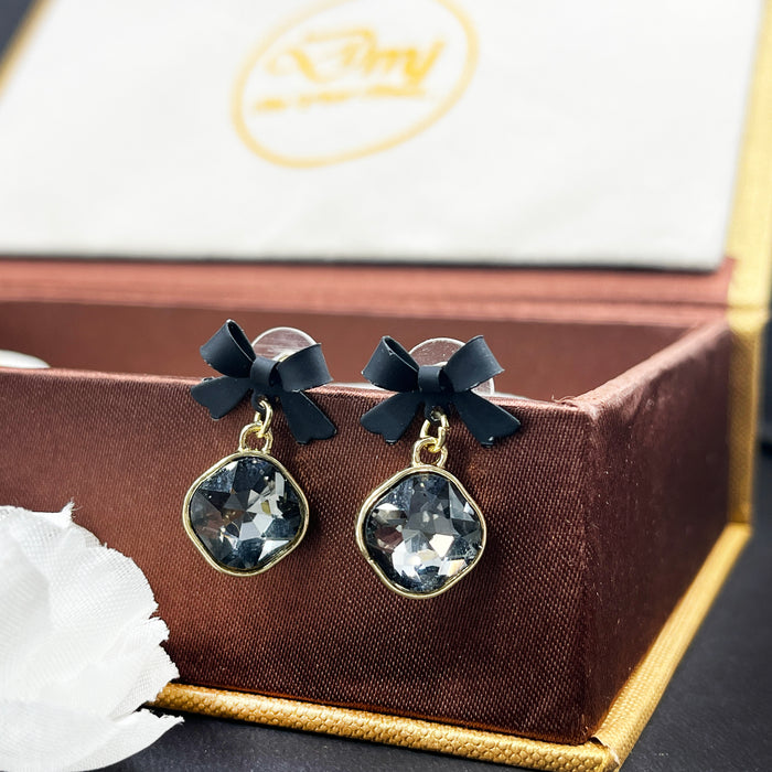 Elegant Black Bow & Crystal Drop Earrings – Gold Trimmed Statement Studs