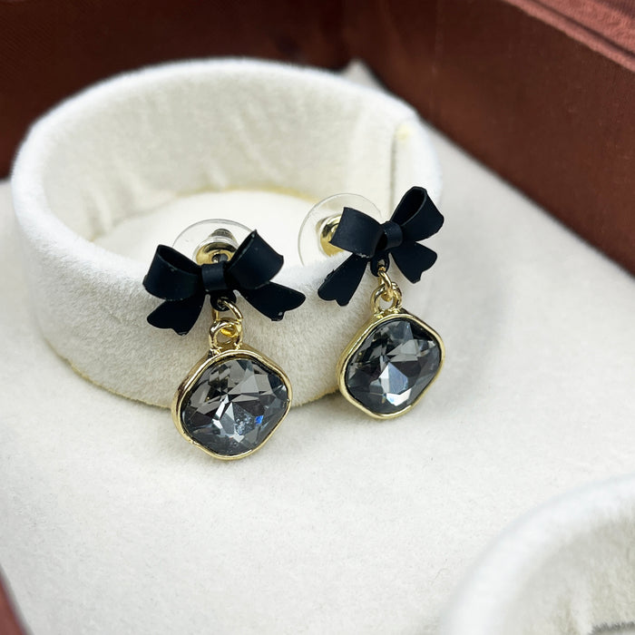 Elegant Black Bow & Crystal Drop Earrings – Gold Trimmed Statement Studs